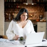 Woman researching on laptop